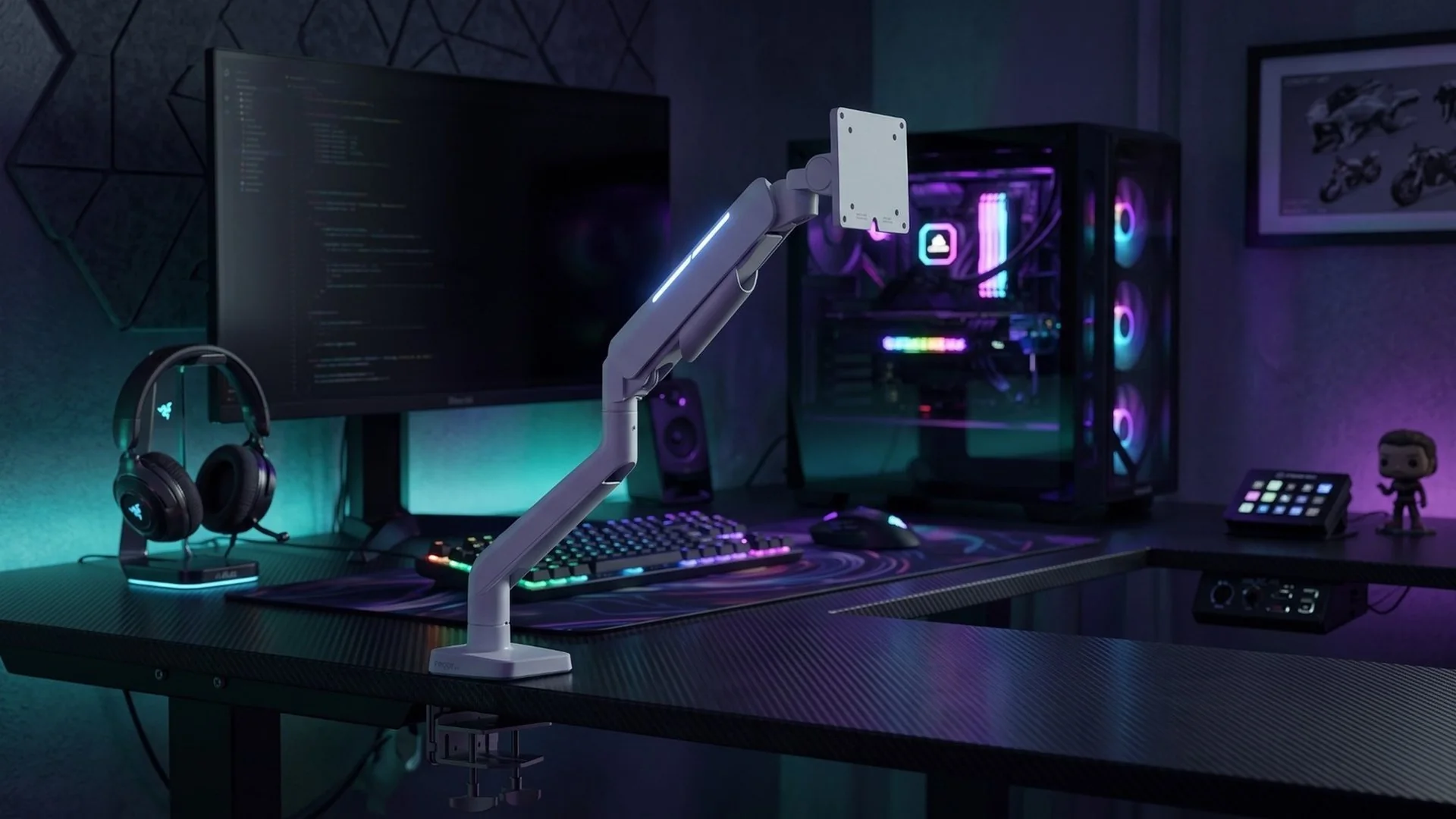 InterFlex HeavyLift RGB monitor arm mounted on a gaming desk with an illuminated PC